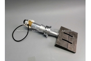 ultrasonic transducer with booster